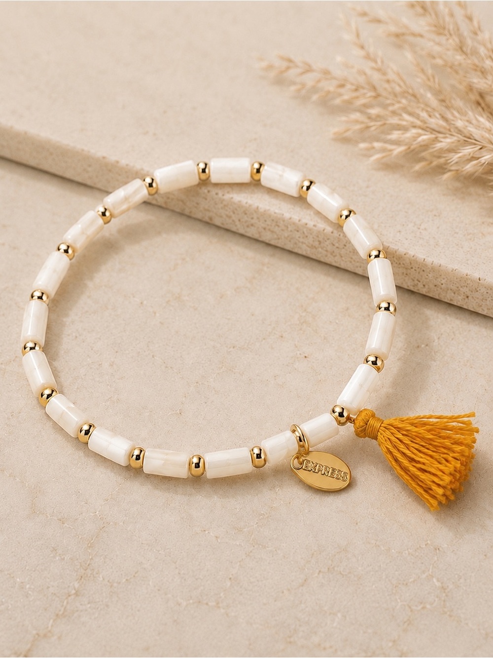 NWT Express White Beaded Stretch Bracelet with Gold-Tone Accents & Tassel